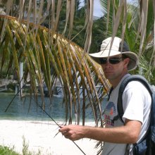 Duncan Irschick catching lizards in the Bahamas